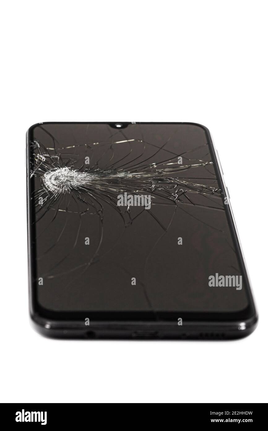 Smartphone mit kaputtem Display, isoliert auf weißem Hintergrund Stockfoto