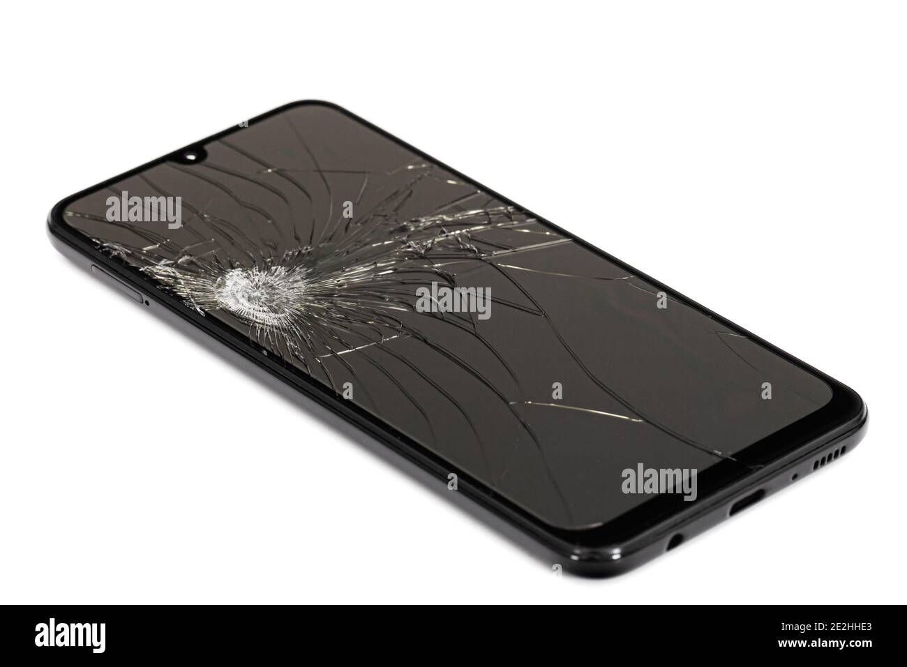 Smartphone mit kaputtem Display, isoliert auf weißem Hintergrund Stockfoto