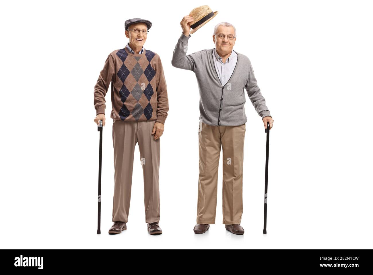 Herren mit Wanderstöcken, ein Gruß mit seinem Hut isoliert auf weißem Hintergrund Stockfoto
