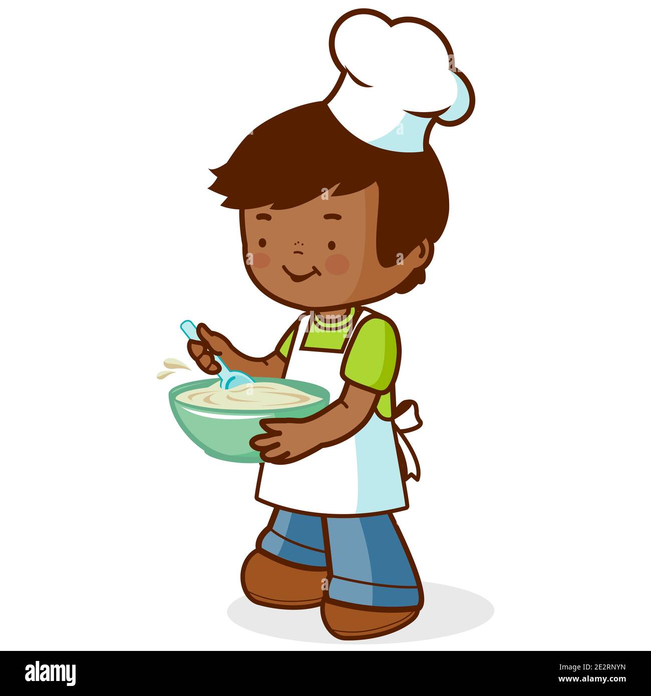 Ein kleiner Junge in Küchenuniform, der eine Schüssel hält und kocht. Kind mit Kochmütze in der Küche zu Hause oder in der Bäckerei. Stockfoto