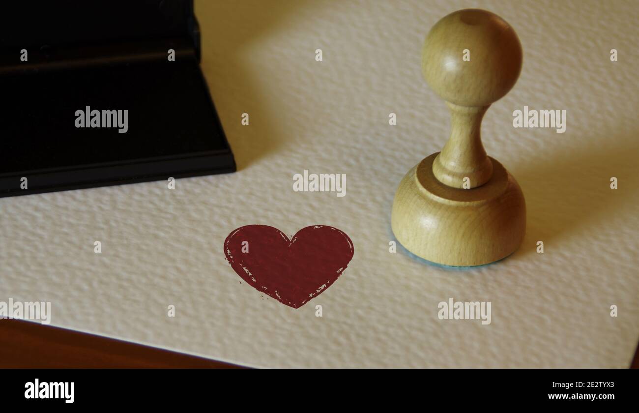 Herz Gesundheit und Liebe Symbol Stempel und Stempelhand. Romantisches, Herz, Feier Botschaft Konzept. Stockfoto