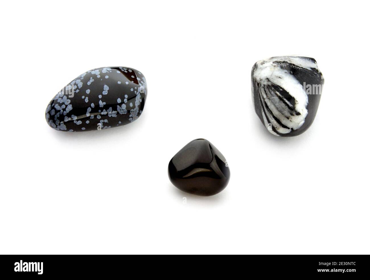Polierte Edelsteine - drei verschiedene Obsidien auf weißem Hintergrund Stockfoto Polierte Edelsteine - drei verschiedene Obsidien auf weißem Hintergrund Stockfoto