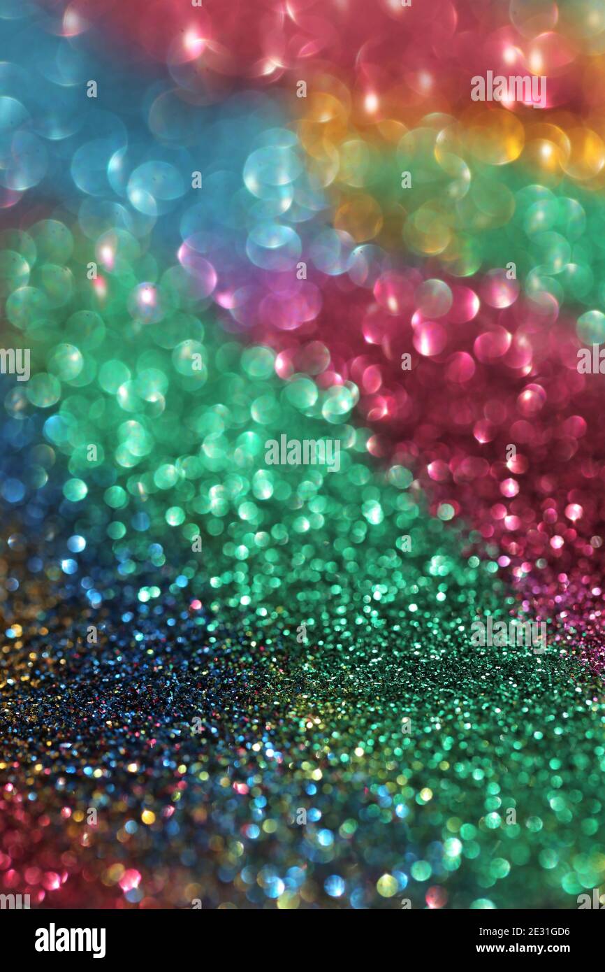 Tapete Telefon Glitter.Glitzer Strahlkraft Oberfläche. Mehrfarbig bunte Glitter mit glänzenden Bokeh.Festlicher Hintergrund. Neujahr und Weihnachten Stockfoto