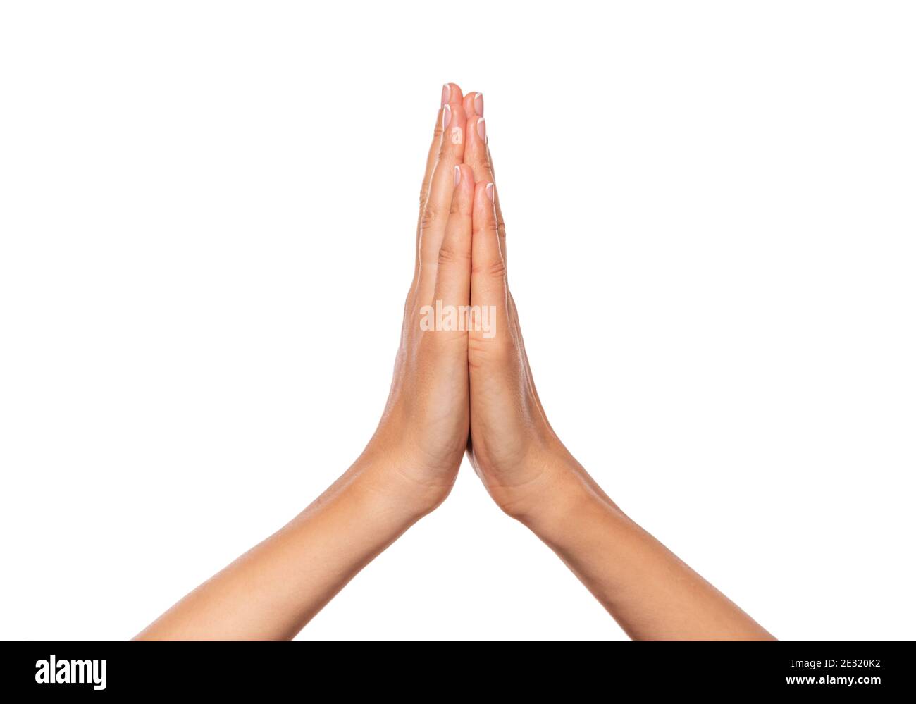 Weibliche Hände zusammengefaltet isoliert auf weißem Hintergrund. Stockfoto