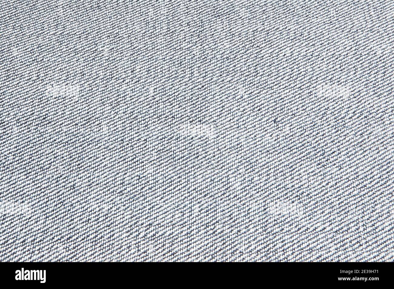 Fragment eines Jeansstückes in Nahaufnahme. Die Textur des Stoffes. Stockfoto