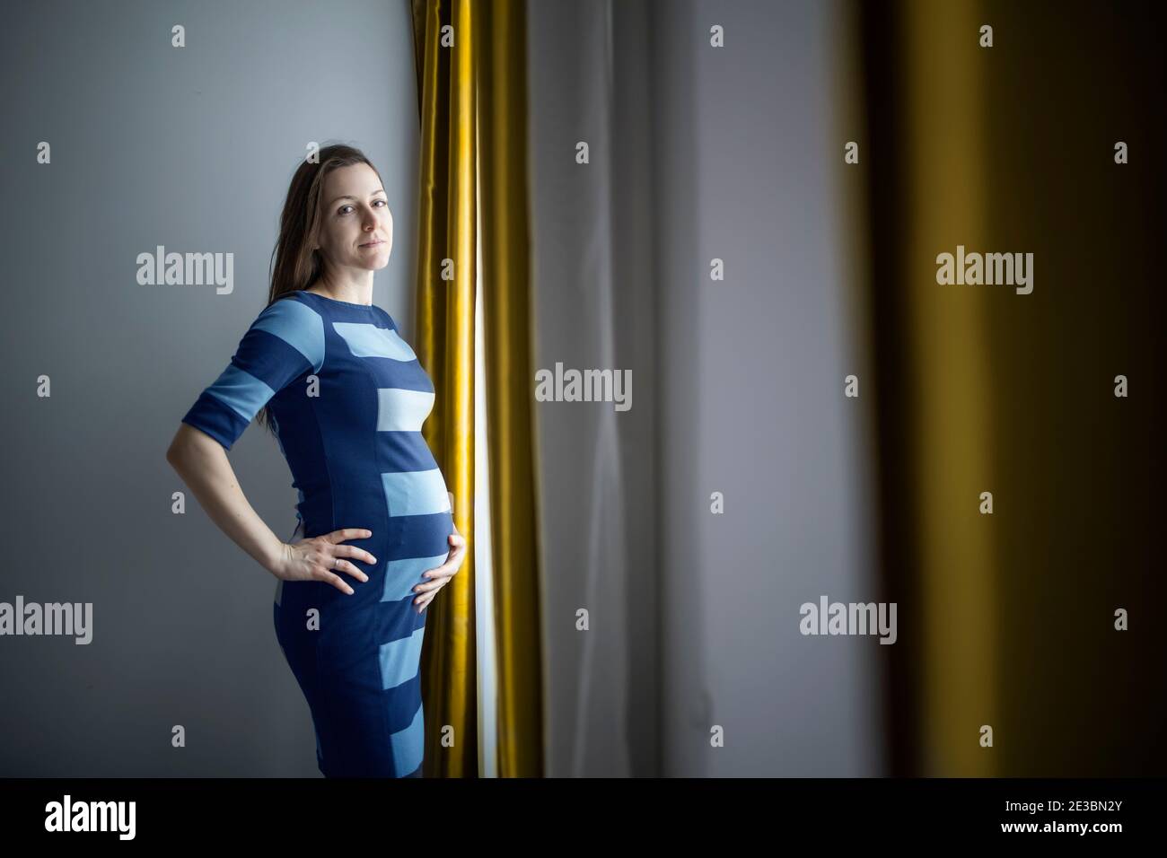 Zukünftige Mutter glücklich für ein Baby in ihrem Mutterleib Stockfoto