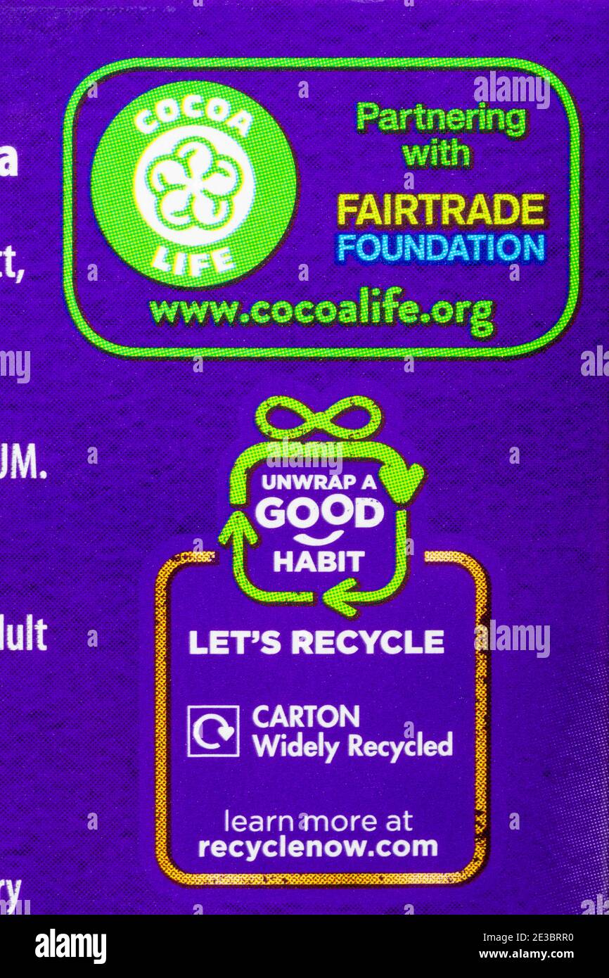 Cocoa Life Partnerschaft mit Fairtrade Foundation eine gute Gewohnheit auswickeln Lassen Sie uns recyceln - Detail auf Schachtel Cadbury Heroes Pralinen Stockfoto