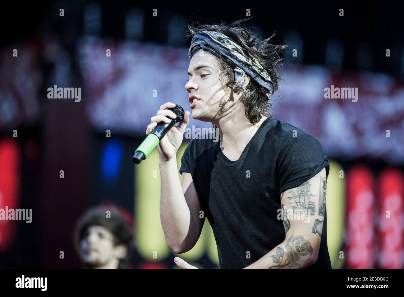 Kopenhagen, Dänemark. Juni 2014. Die beliebte Boyband One Direction gibt ein Live-Konzert im Park in Kopenhagen. Hier ist Sänger Harry Styles live auf der Bühne zu sehen. (Foto: Gonzales Photo - Lasse Lagoni). Stockfoto