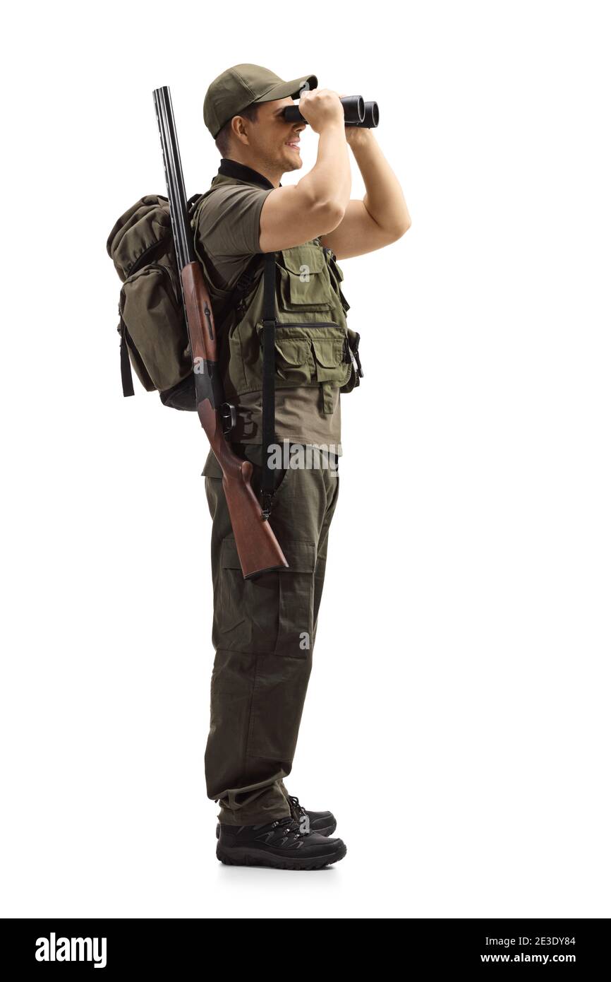 In voller Länge Profilaufnahme eines Jägers in Uniform Blick durch Ferngläser isoliert auf weißem Hintergrund Stockfoto
