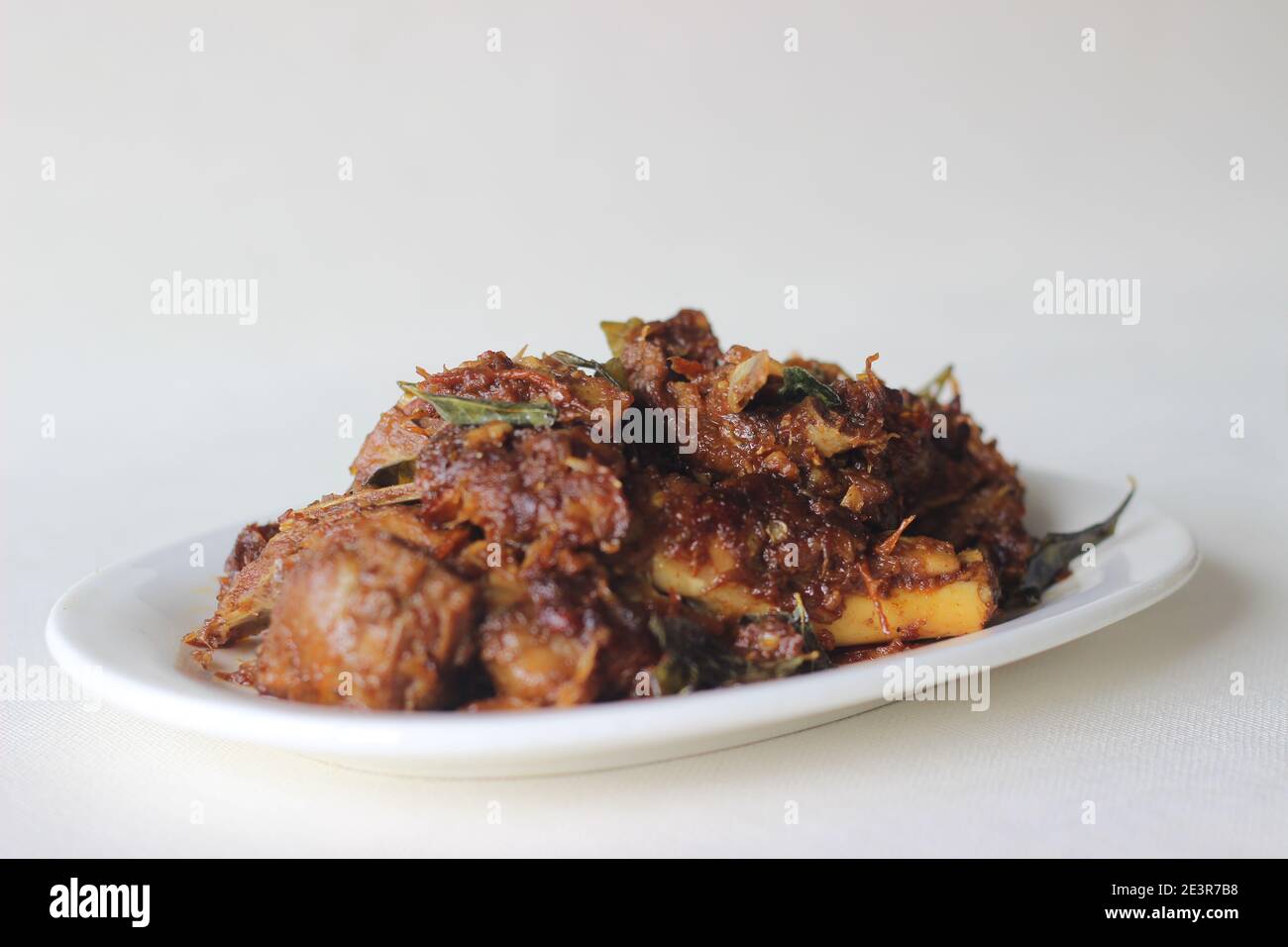 Würziger Hammelbraten im Kerala-Stil für besondere Anlässe wie Weihnachten, Ostern, Onam und andere Feste zubereitet Stockfoto