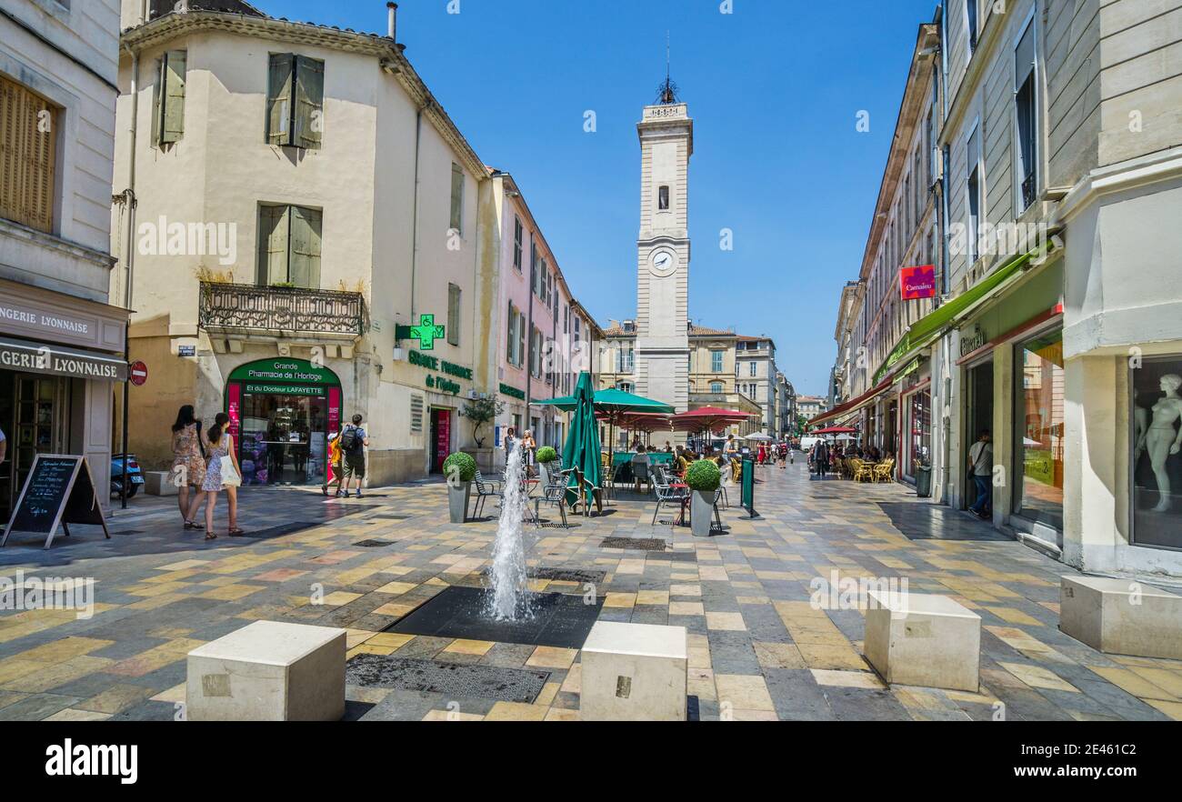 Place de l'Horloge und der Uhrturm der antiken Stadt Nimes, Gard-Abteilung Okzitanien Region, Südfrankreich Stockfoto
