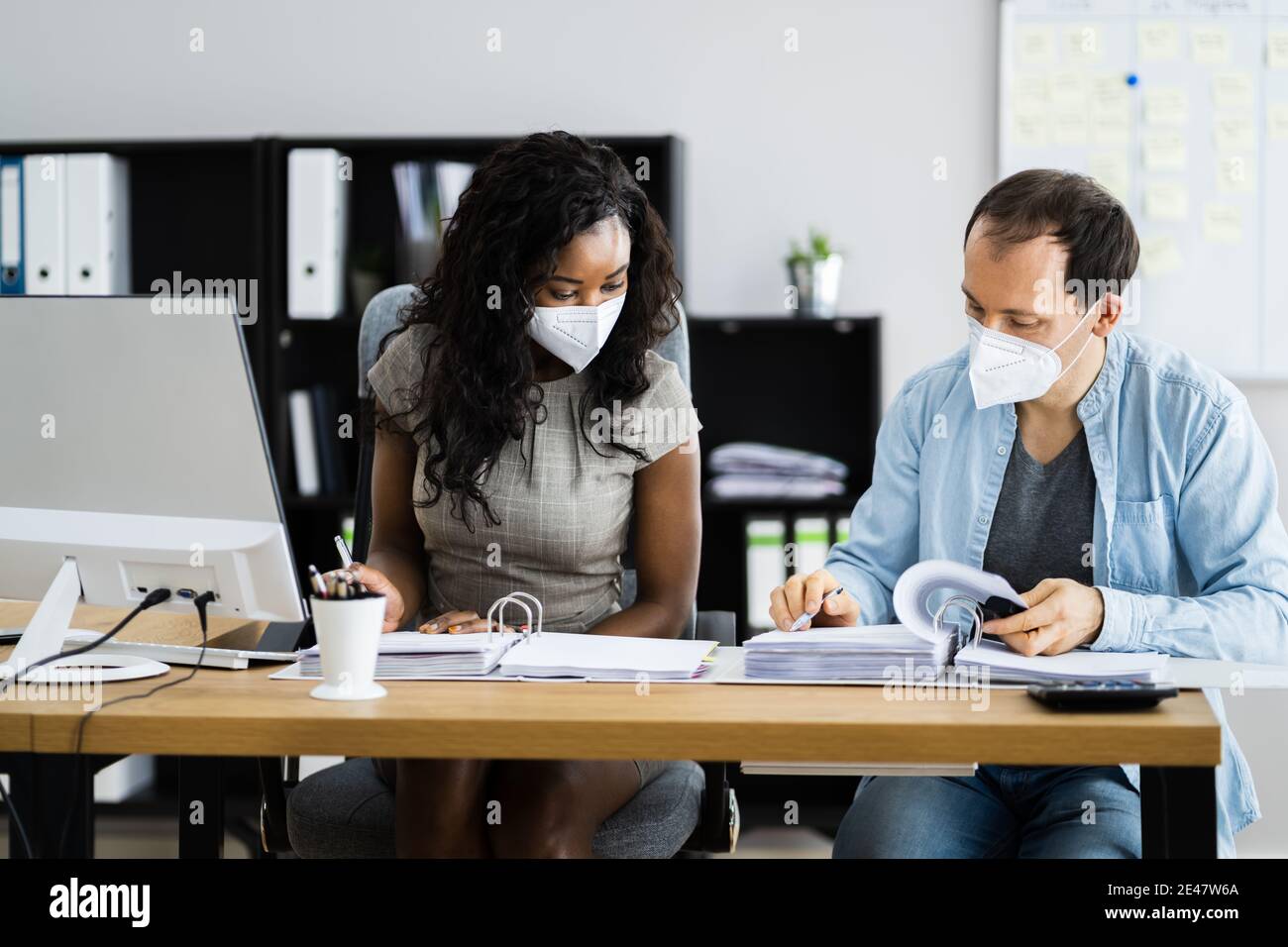 African American Accountant Business People In Face Mask Stockfoto
