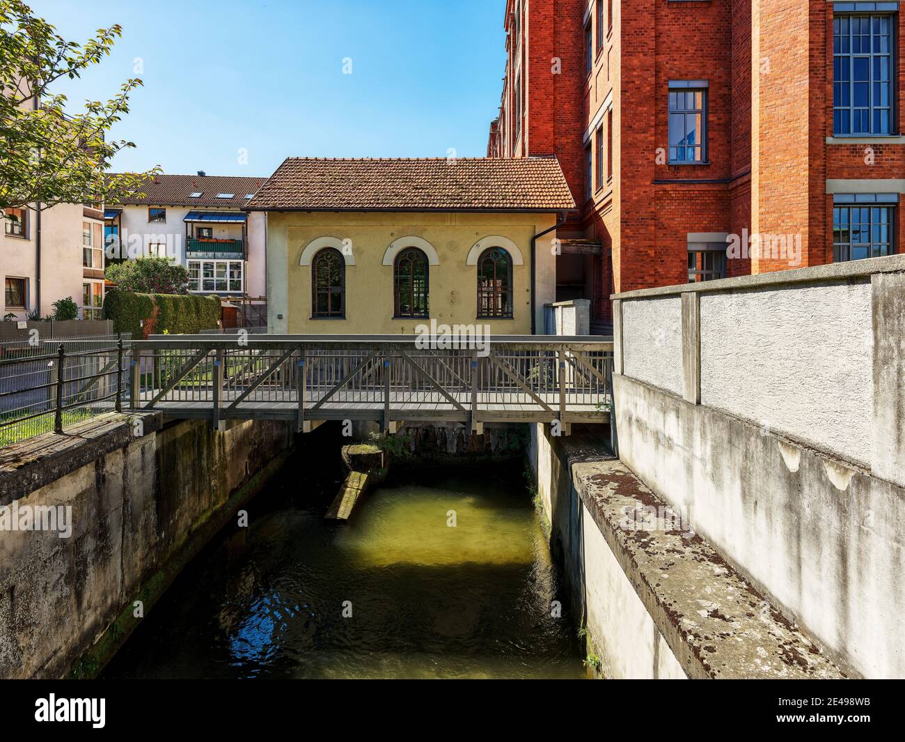 Fluss, fließendes Wasser, Kanal-wie, Wasserkraft, Wasserkraftwerk, Ziegel, Backstein Gebäude, Klinker Fassade, Spinnerei, Weberei, Weltkulturerbe, Denkmal, historisches Denkmal, Ort von Interesse Stockfoto