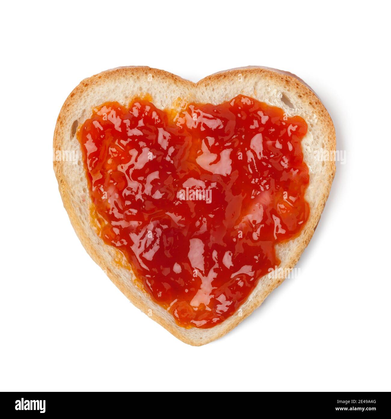 Herzförmige Brotscheibe mit Marmelade aus Hagebutten Isoliert auf weißem Hintergrund Stockfoto