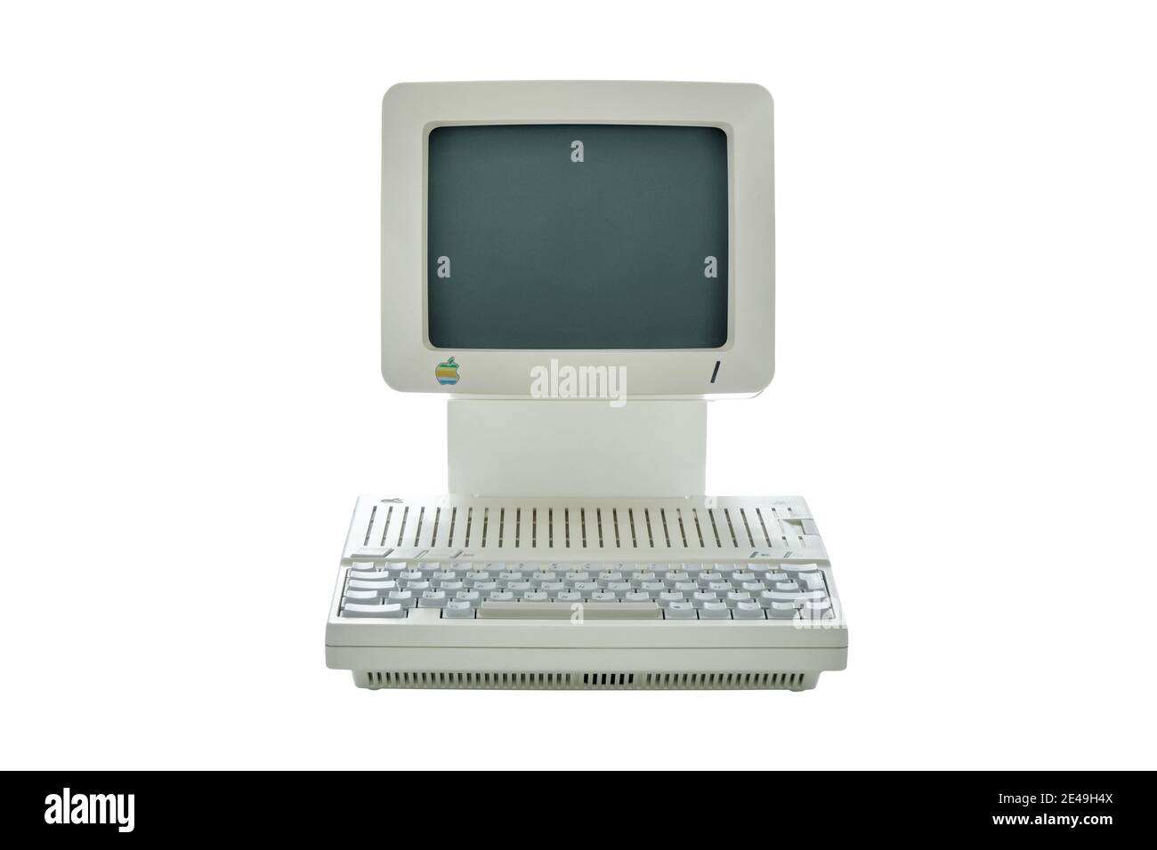 Vintage klassischen Apple Desktop-Computer aus den achtziger Jahren mit integriertem Monitor und Tastatur auf weißem Hintergrund isoliert Stockfoto