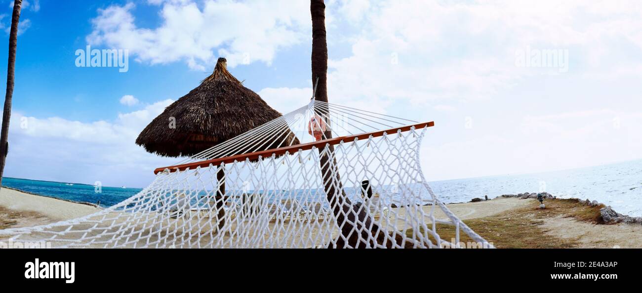 Hängematte am Strand, Key Largo, Florida Keys, Florida, USA Stockfoto