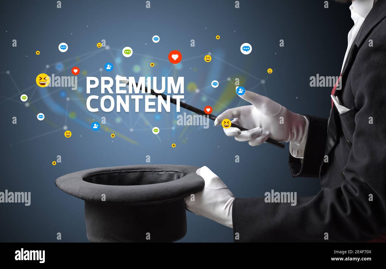 Magier zeigt Zaubertrick mit PREMIUM-CONTENT-Inschrift, Social-Media-Marketing-Konzept Stockfoto