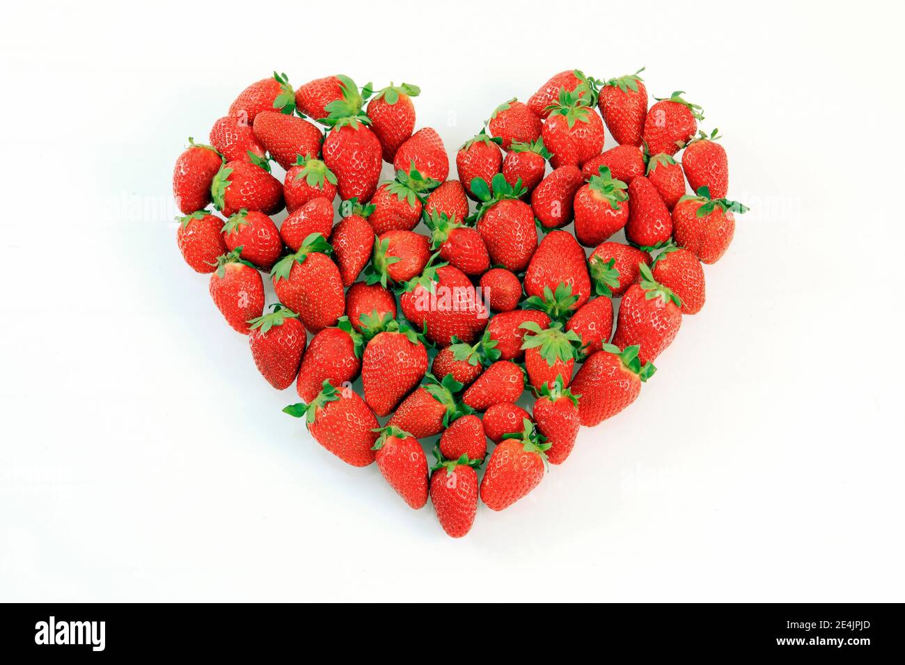 Erdbeeren in der Form eines Herzens Stockfoto