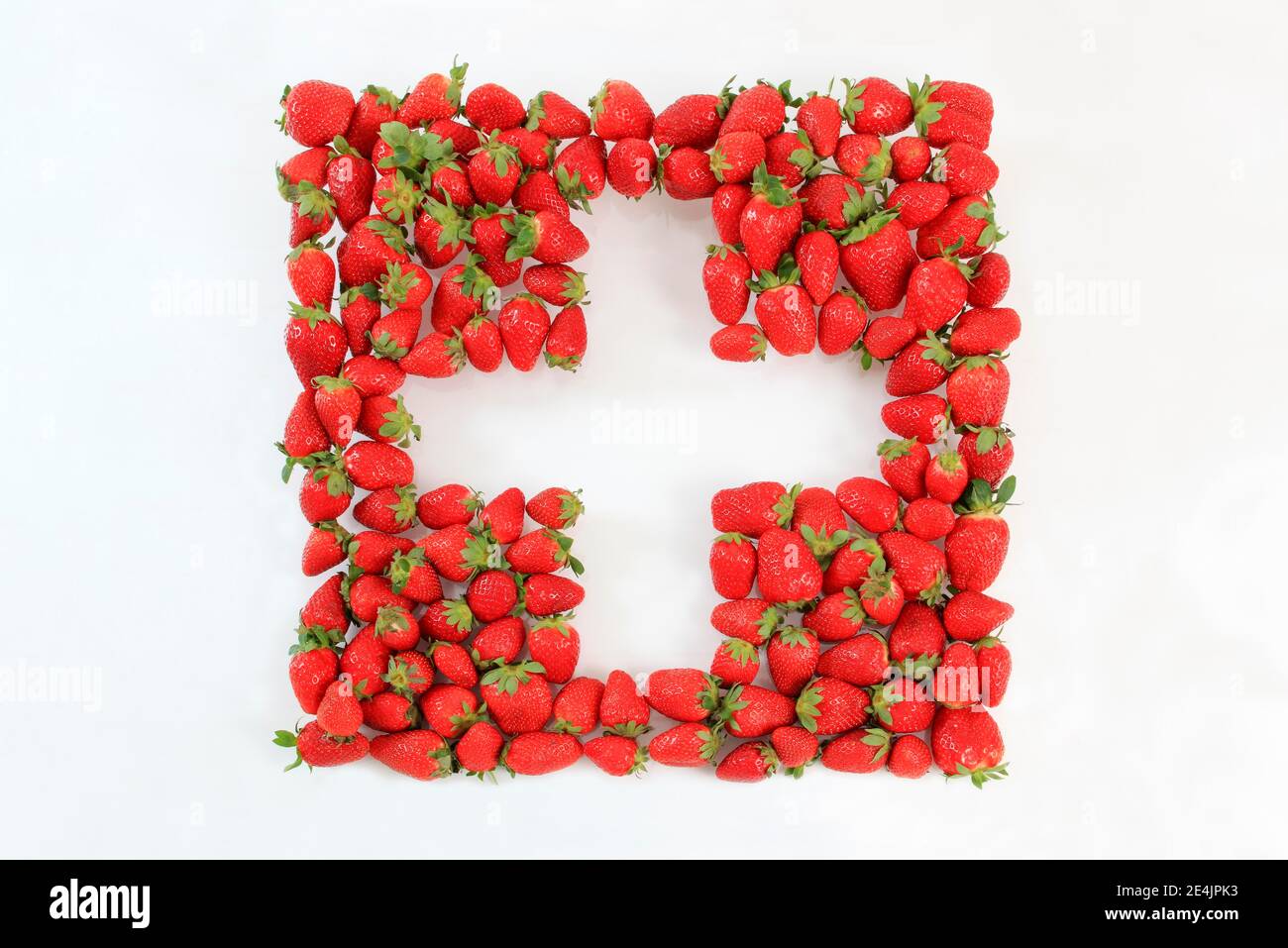 Erdbeeren in Form eines Schweizer Kreuzes Stockfoto