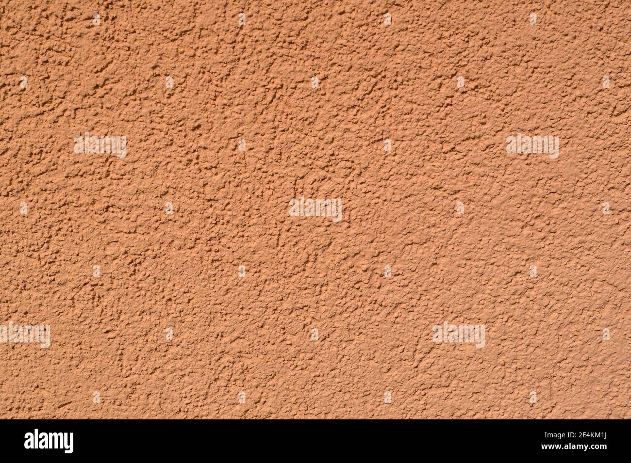Textur der alten hellorangefarbenen Wand Stockfoto