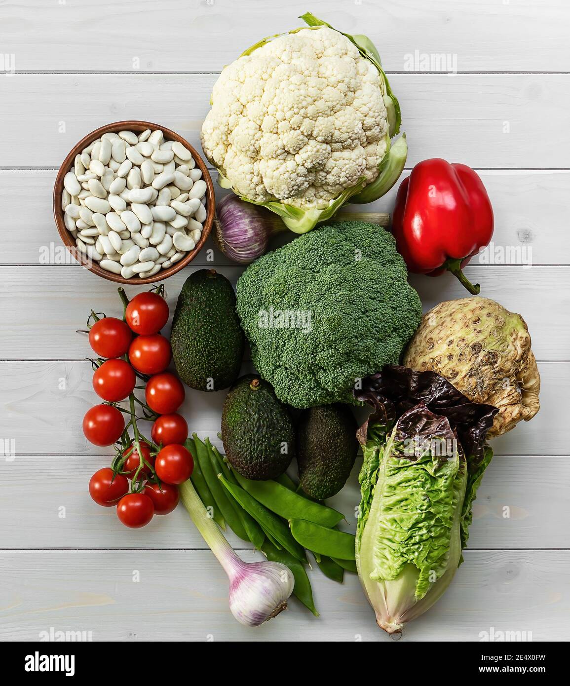 Gesunde Ernährung Hintergrund, trendige pflanzliche Ernährung Produkte - frisches rohes Gemüse Stockfoto