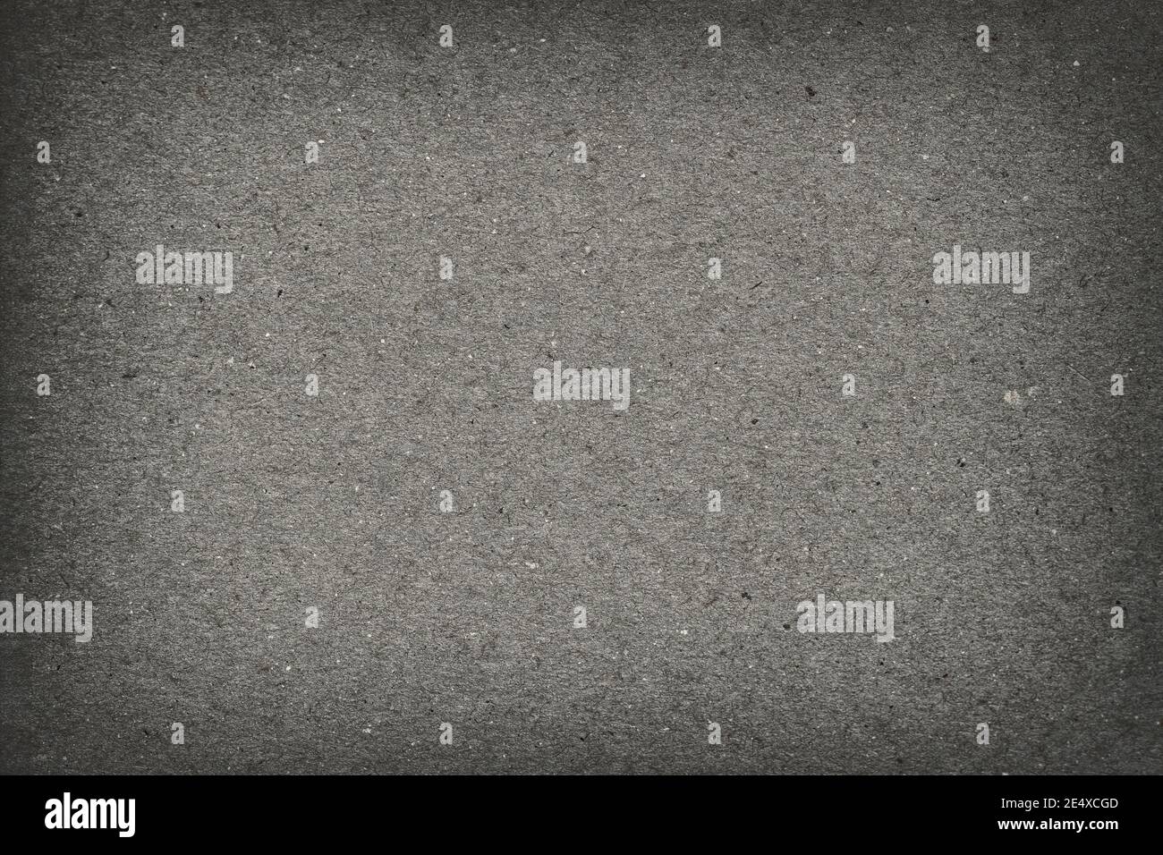 Textur aus dunkelgrauem schwarzem Karton Nahaufnahme, vintage Hintergrund Stockfoto