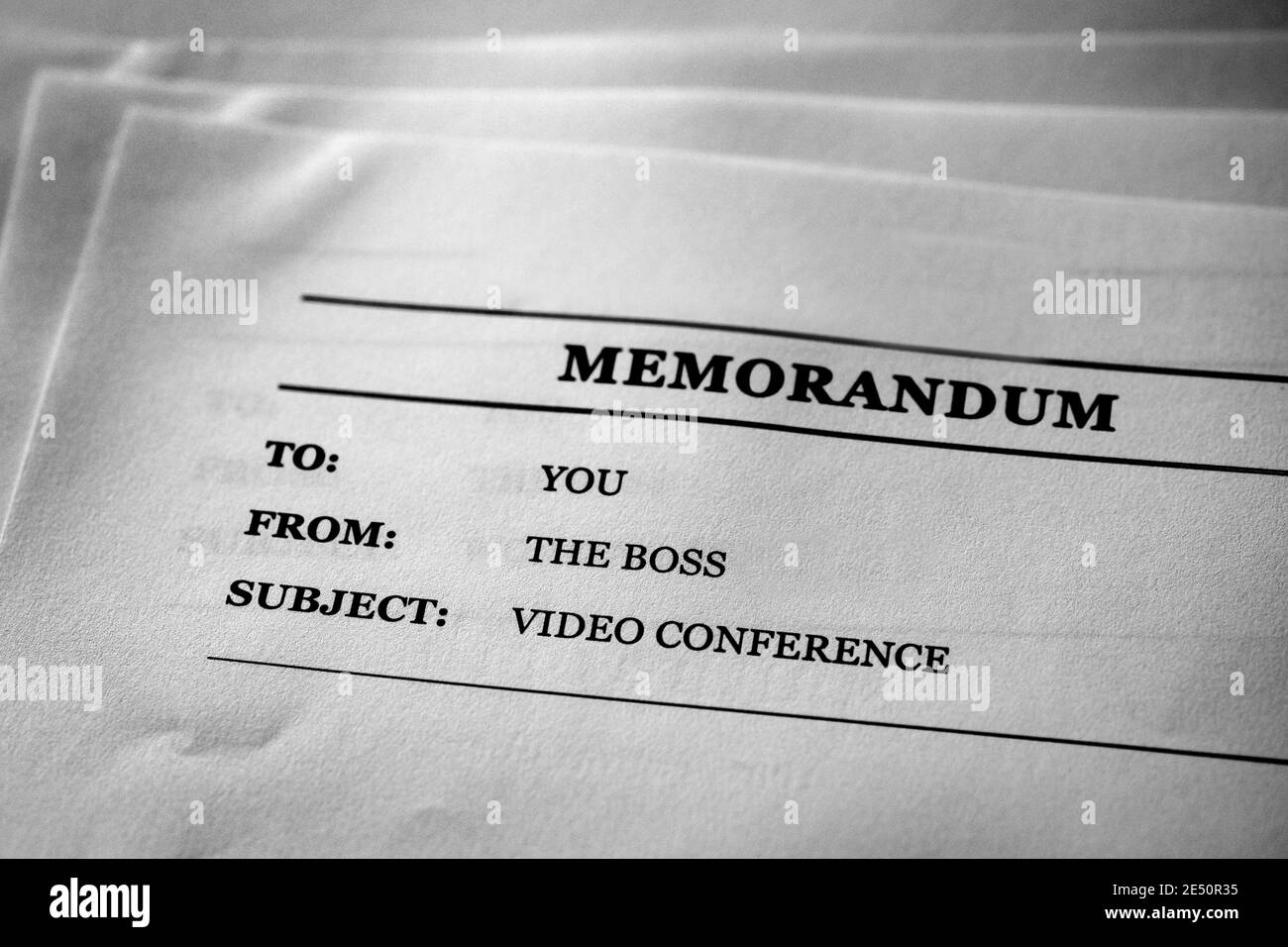 Schriftliche Arbeitsnotiz von der Boss Video Conference Stockfoto