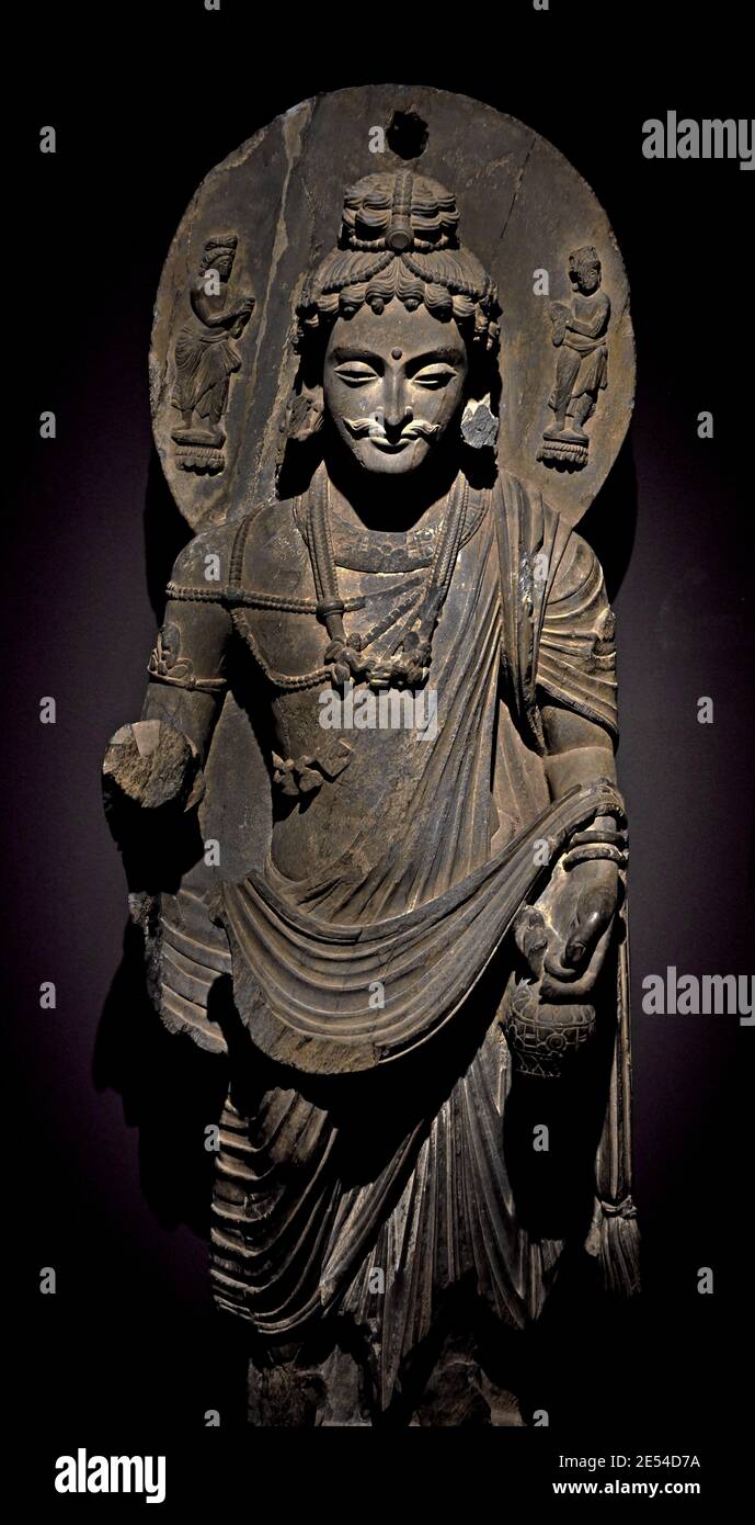 Bodhisattva Maitreya 3. jh. C. E. PAKISTAN, AFGHANISTAN Kushan-Zeit (50-320 C.E.) Material Grauer Schiefer Stockfoto