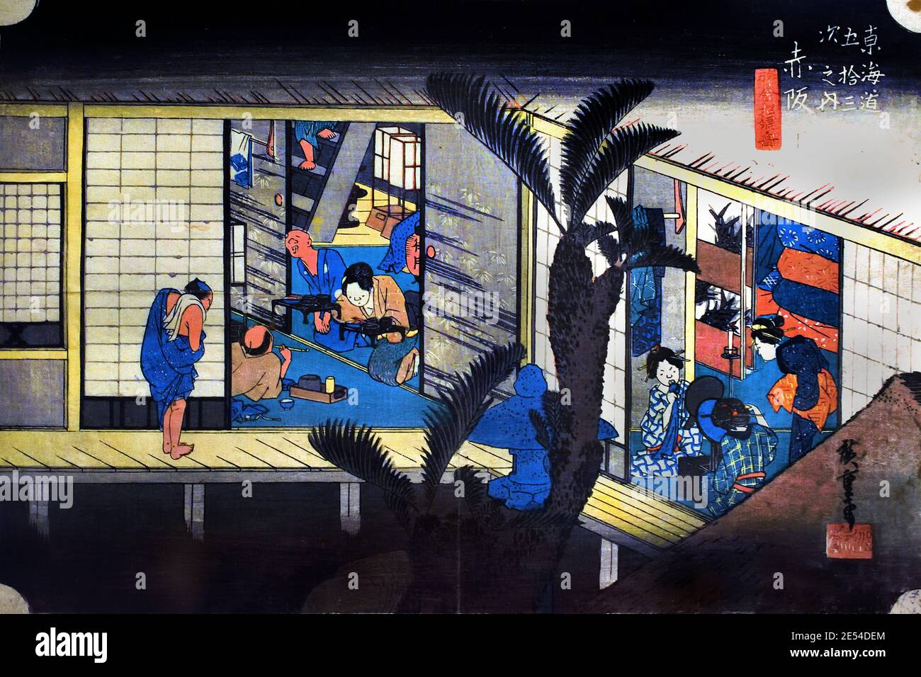 Akasaka Servierende Frauen des Gasthauses Ukiyo-e-Holzschnitt von Utagawa Hiroshige, 1833. Station 37 aus Die dreiundfünfzig Stationen des Tokaido. Edo-Zeit Japan.Akasaka, Gasthaus mit Dienstmädchen Nr. 37 aus der Serie "Dreiundfünfzig Stationen der Tōkaidō" Etwa 1833-1834 von Andō Hiroshige, Edo (heute Tokio) 1797 – Edo 1858 Holzschnitt Japanisch, Japan, Stockfoto