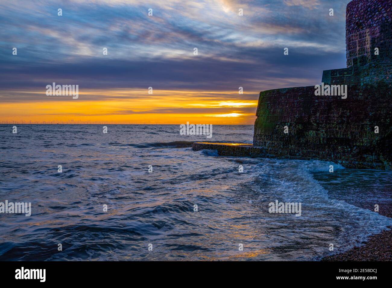 Sonnenuntergang am Brighton Beach, East Sussex, England, Großbritannien Stockfoto