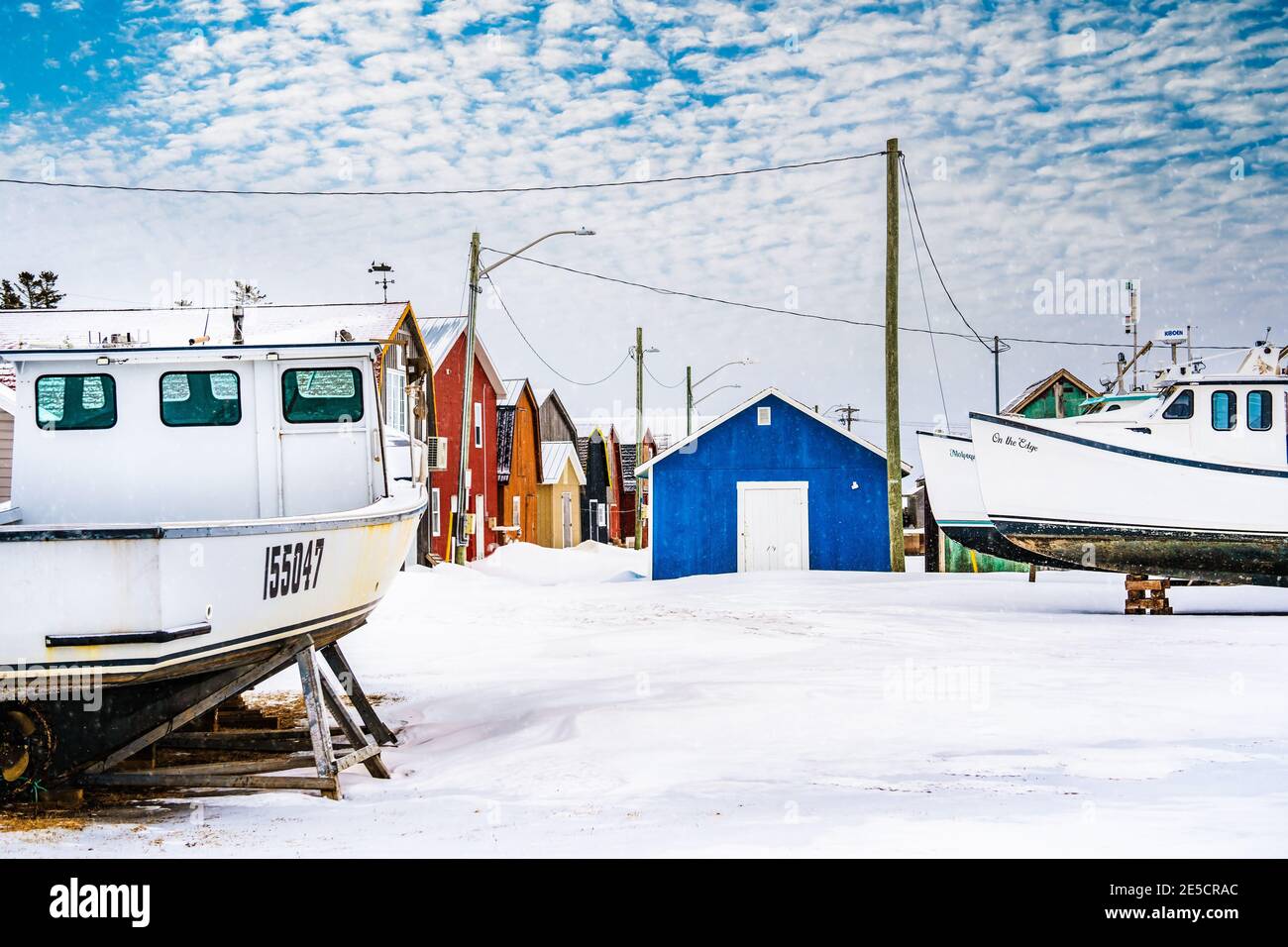 Hummer Fischerboote blockiert für den Winter an einem ländlichen Kai in Prince Edward Island, Kanada. Stockfoto