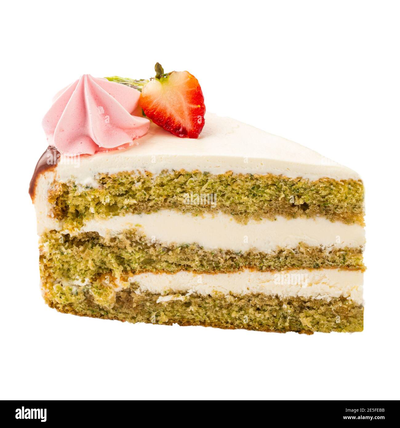 Isolierte Scheibe mit dekoriertem Spinat-Biskuitkuchen Stockfoto