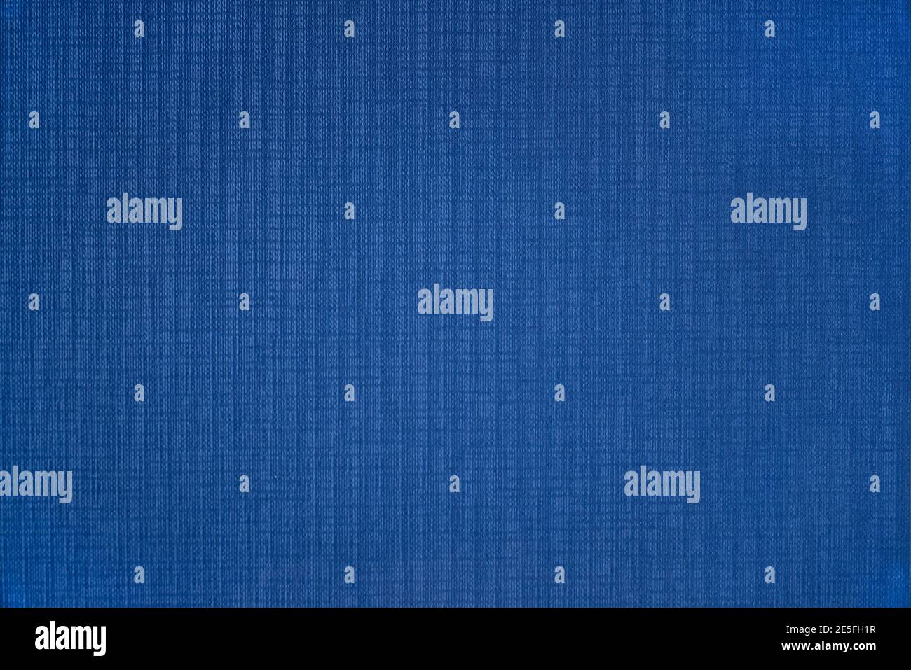 Textur eines Blattes oder gewebten Stoffes von blauer Farbe Stockfoto