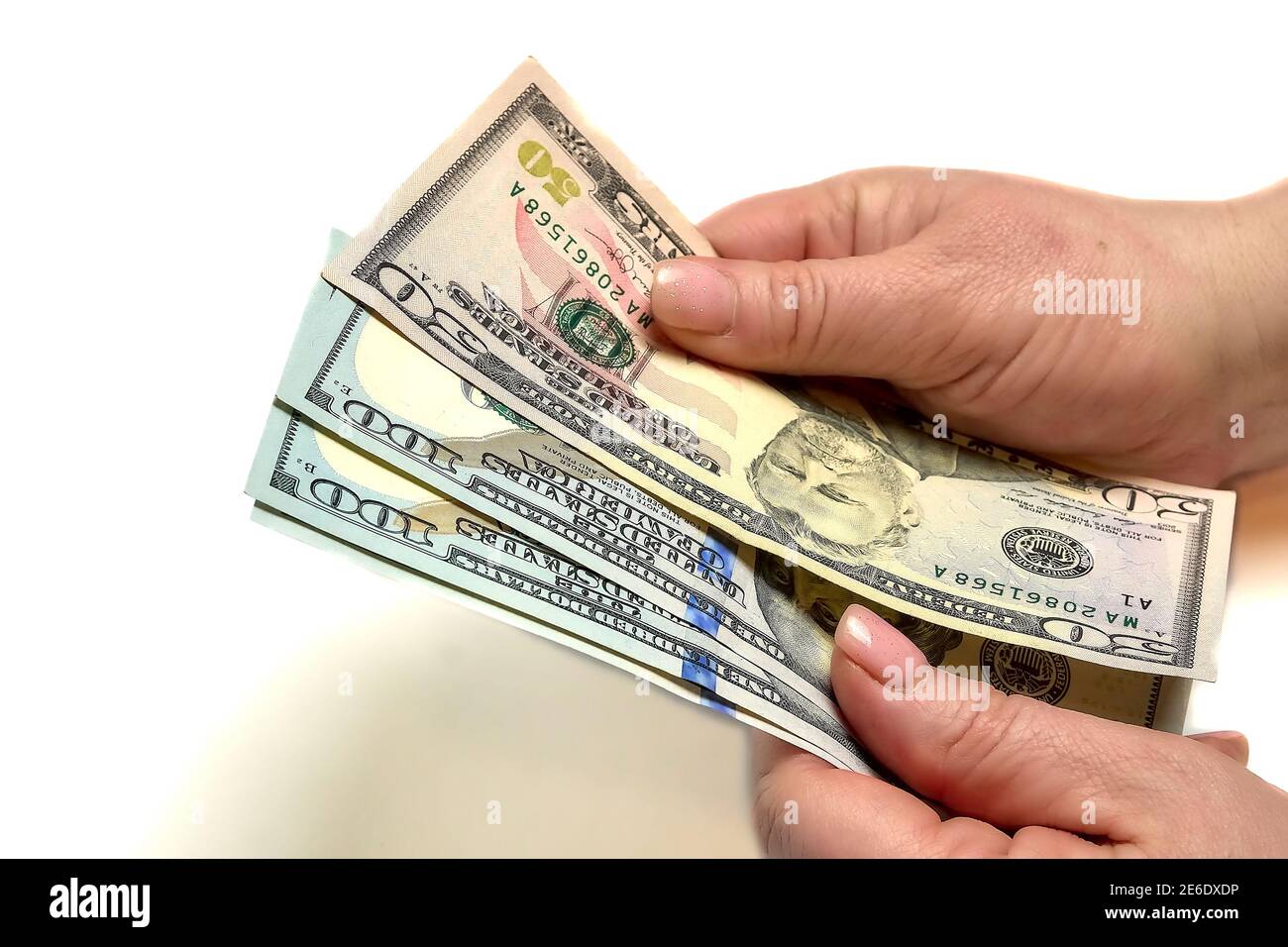 Mädchen zählt Dollar, Geld finanziert Stockfoto