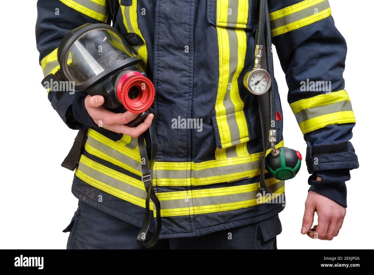 Volle schützende Atemschutzmaske in der Hand von nicht erkannten Feuerwehrmann Stockfoto