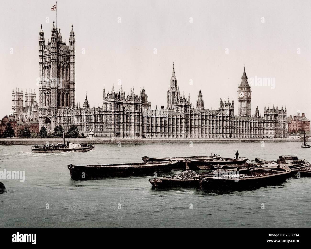 Vintage 19. Jahrhundert / 1900 Foto: Palace of Westminster, Houses of Parliament, Big Ben Uhr, von der Themse aus gesehen mit Booten im Vordergrund. Stockfoto