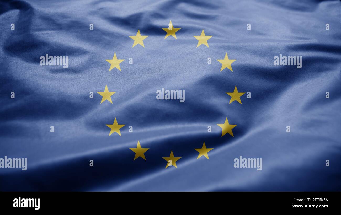 Die Flagge der Europäischen Union winkt im Wind. Nahaufnahme von Europa Banner weht, weiche und glatte Seide. Stoff Stoff Textur Fähnrich Hintergrund. Verwenden Sie es für na Stockfoto