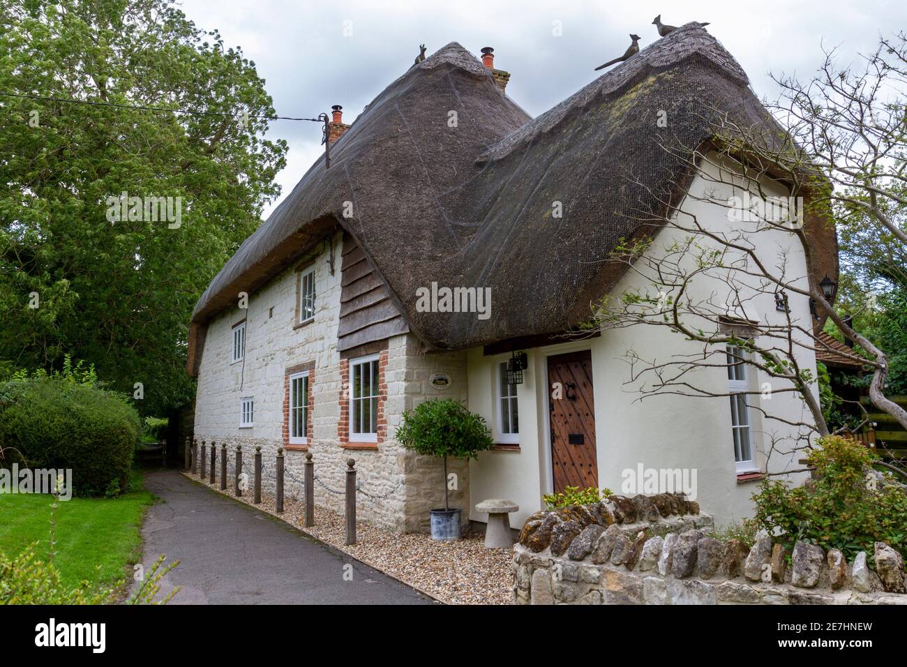 Benjys Cottage, ein Reethaus benannt nach dem Charakter in Tom Brown Schulzeit, Uffington, Oxfordshire, Großbritannien. Stockfoto
