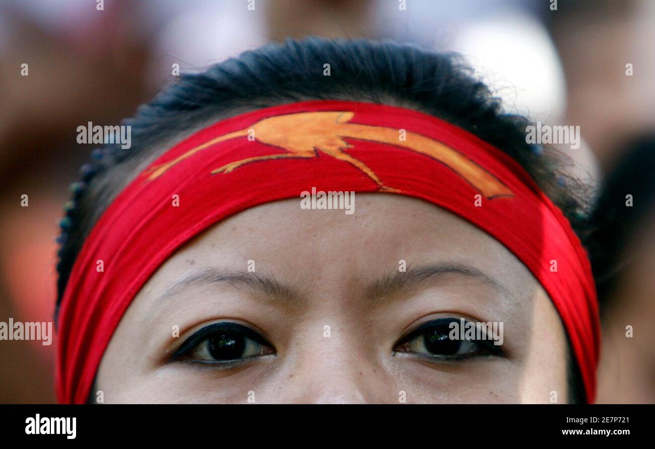 Eine pro-Demokratie Aktivist besucht eine Protestkundgebung in Neu-Delhi, 1. Oktober 2007, verurteilt das scharfe Vorgehen gegen friedliche Demonstranten in Myanmar Militär ausgeschlossen. REUTERS/Desmond Boylan (Indien) Stockfoto