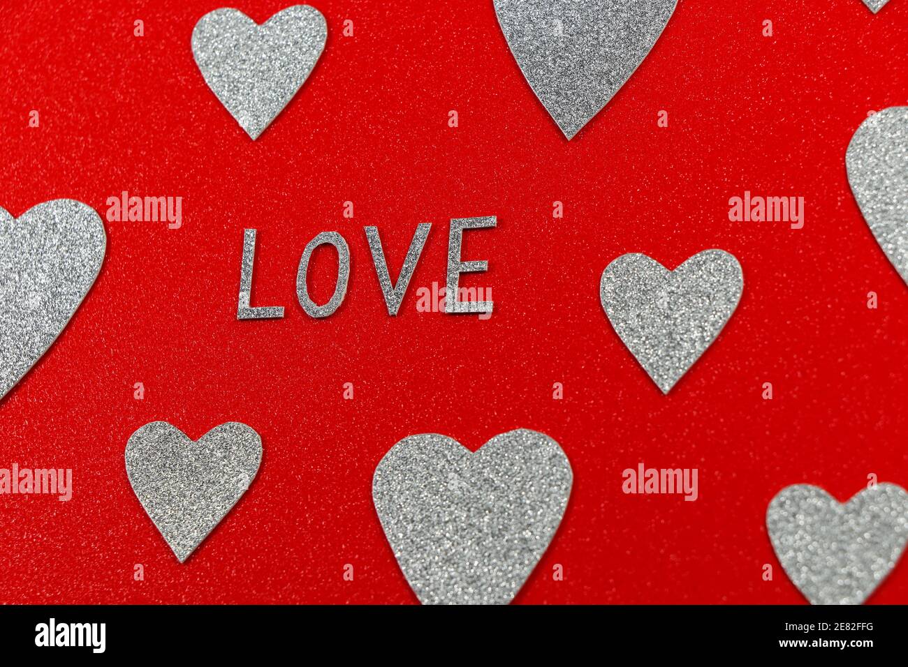 Love Silver Hearts Auf Red Design Abstract Stockfoto