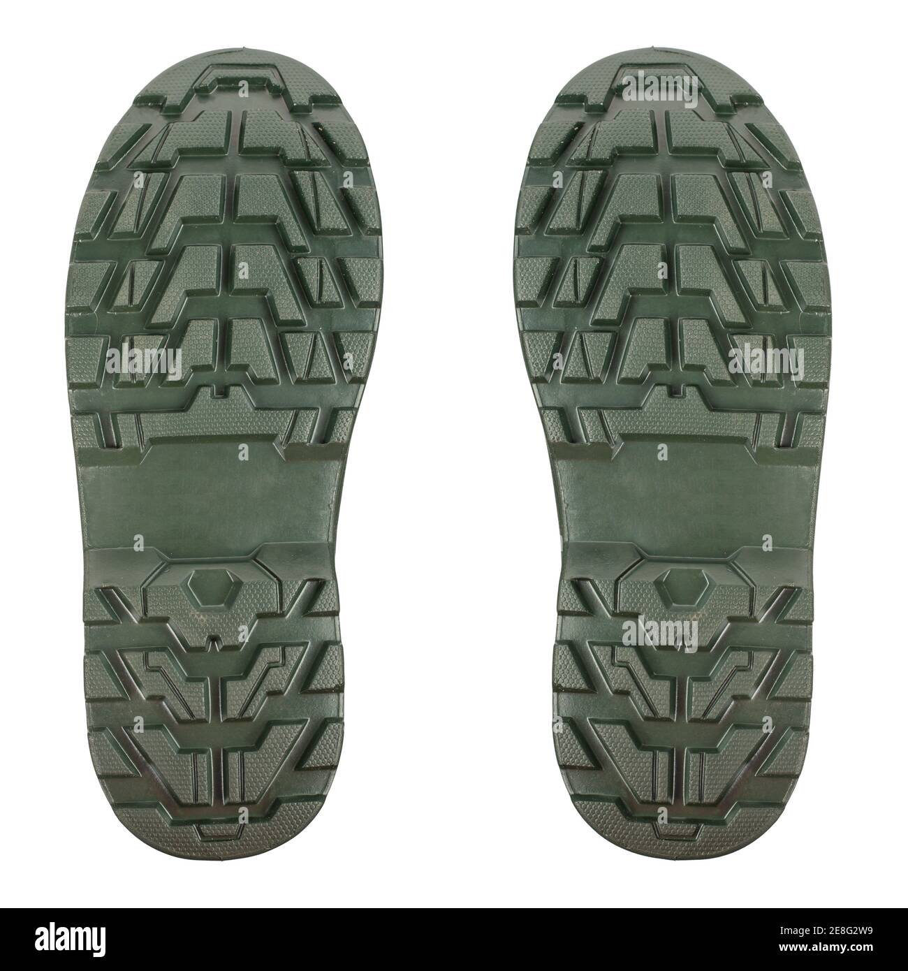 Die Sohle der Gummistiefel ist grün. Leistungsstarker Schuhschutz. Datei enthält Beschneidungspfad. Stockfoto
