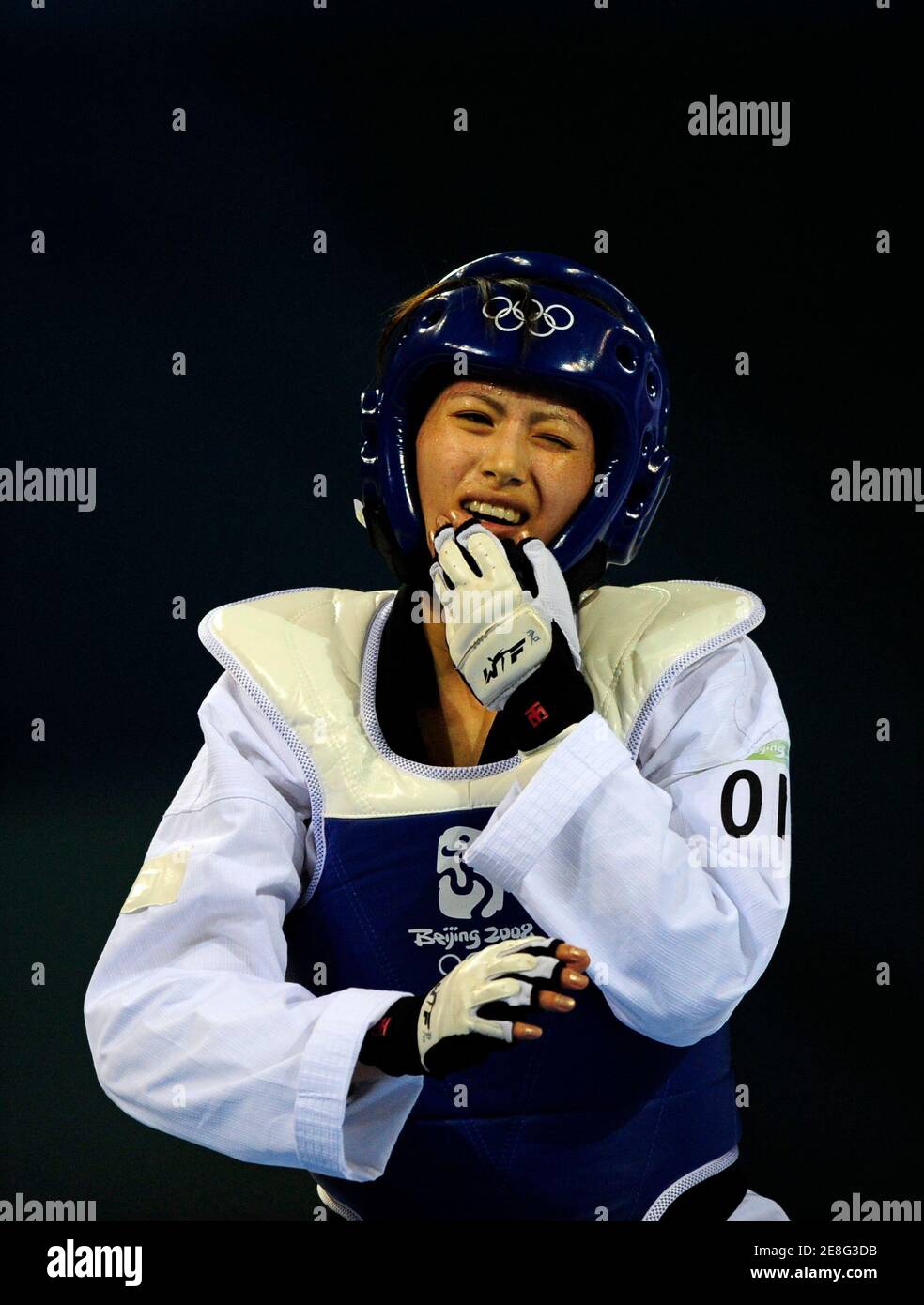 Yang Shu-Chun von Taiwan reagiert nach dem Sieg über Sara Chosch Jamal der Iran während der Frauen bis 49 kg Taekwando Wettbewerb bei den Olympischen Spielen 2008 in Peking 20. August 2008.     REUTERS/Desmond Boylan (CHINA) Stockfoto