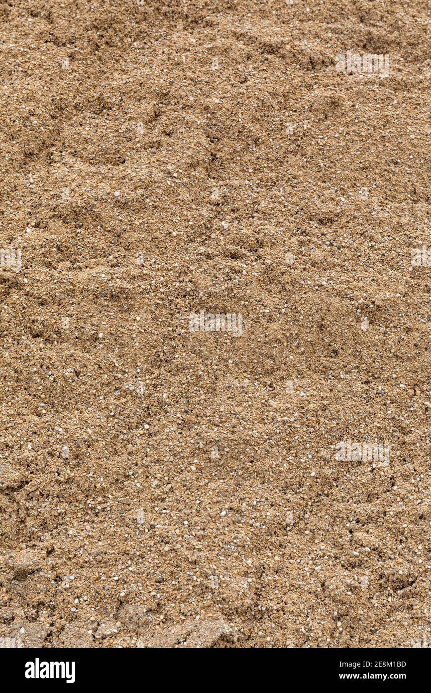 Nahaufnahme von Grit Sand / Sharp Sand zum Verkauf bei einem Bauunternehmen Händler in England, Großbritannien Stockfoto