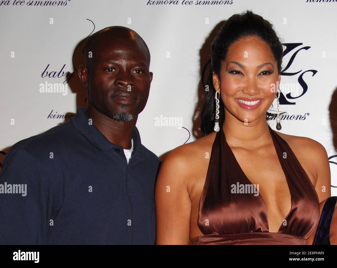 Designer Kimora Lee Simmons und Schauspieler Djimon Hounsou nehmen an einer exklusiven Feier der New York Fashion Week Teil, die am Freitag, den 7. September 2007 in New York City, USA, bei Guastavino's stattfindet. Foto von Gregorio Binuya/ABACAUSA.COM (im Bild: Kimora Lee Simmons, Djimon Hounsou) Stockfoto