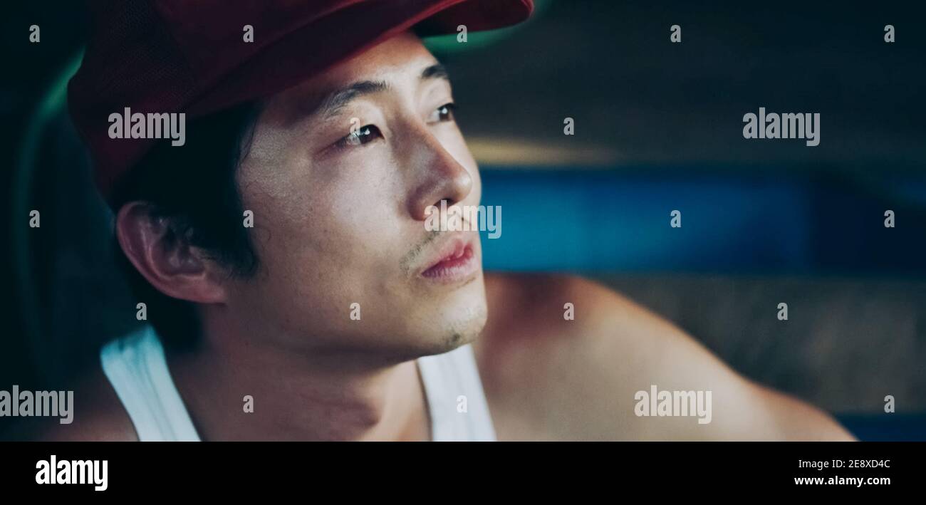 USA. Steven Yeun in ©A24 neuer Film: Minari (2020). Grundstück: Eine koreanische Familie zieht in den 1980er Jahren nach Arkansas, um eine Farm zu gründen. Ref.: LMK110-J6854-180121 geliefert von LMKMEDIA. Nur Redaktionell. Landmark Media ist nicht der Urheberrechtsinhaber dieser Film- oder TV-Standbilder, bietet aber einen Service nur für anerkannte Medien. pictures@lmkmedia.com Stockfoto