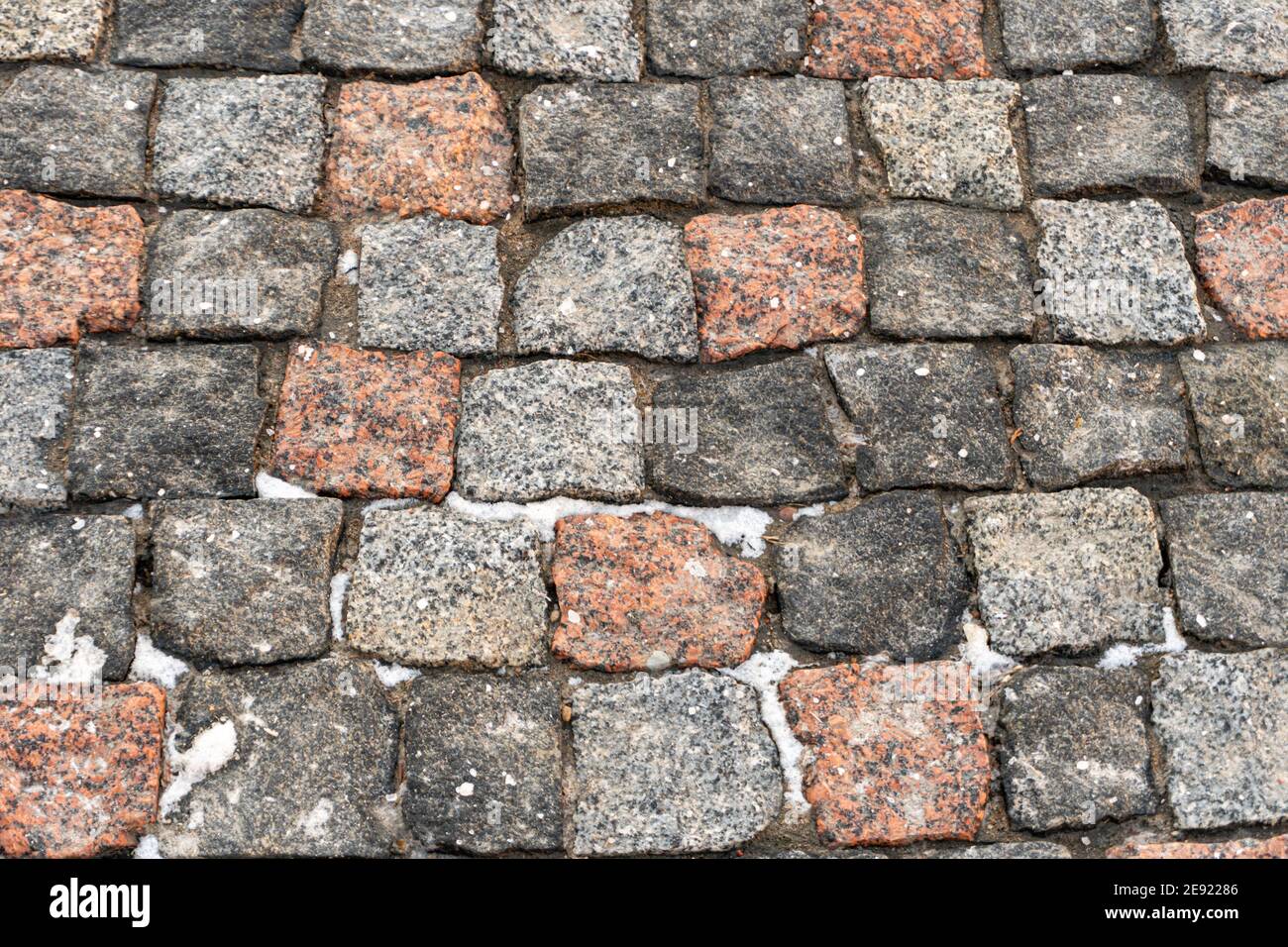 Graue und rote Steinpflaster Platten, Stein Hintergrund, Pflasterstein Muster Stockfoto