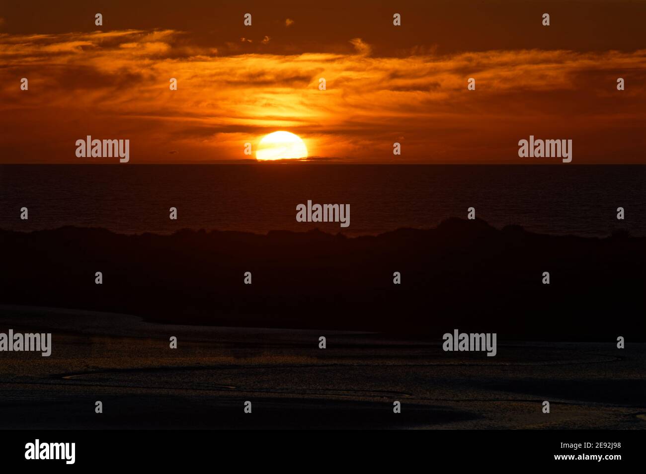 Ein Sonnenuntergang an der Westküste in Neuseeland Stockfoto