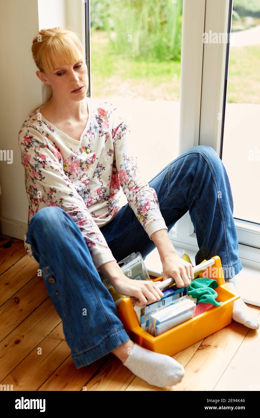 Frau müde von der Hausarbeit Stockfoto