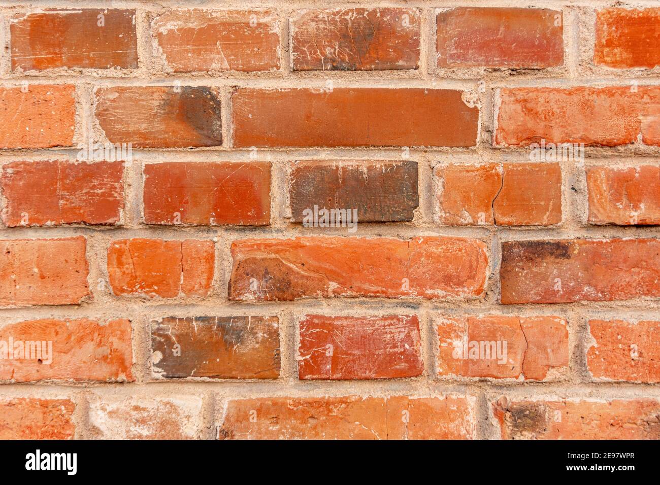 Ziegelwand Nahaufnahme und Steinhintergrund, rotes Ziegelmuster Stockfoto