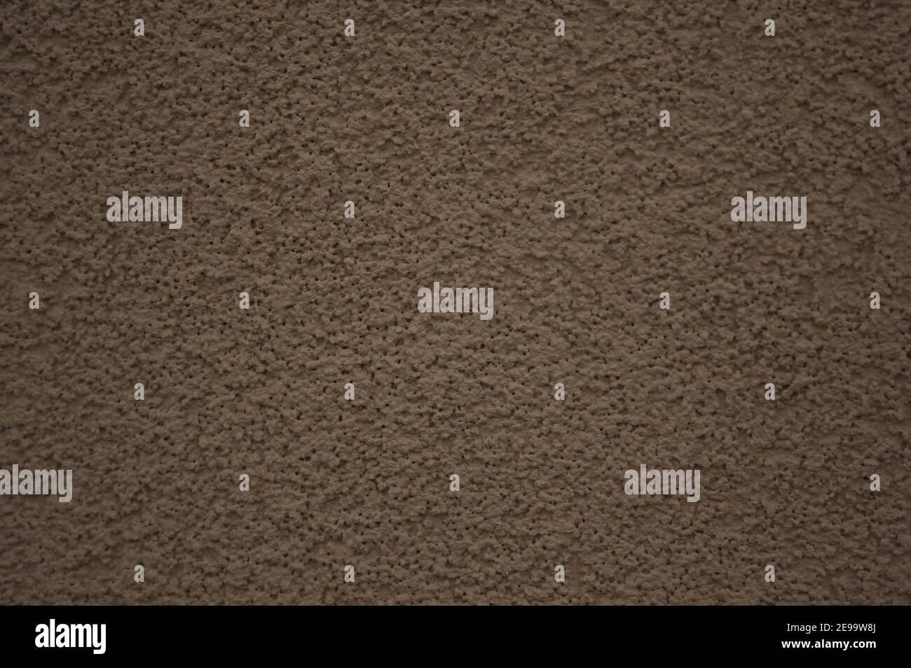 Vollformat nahtlose Textur einer monochromatischen beige gepackte Wand. Stockfoto